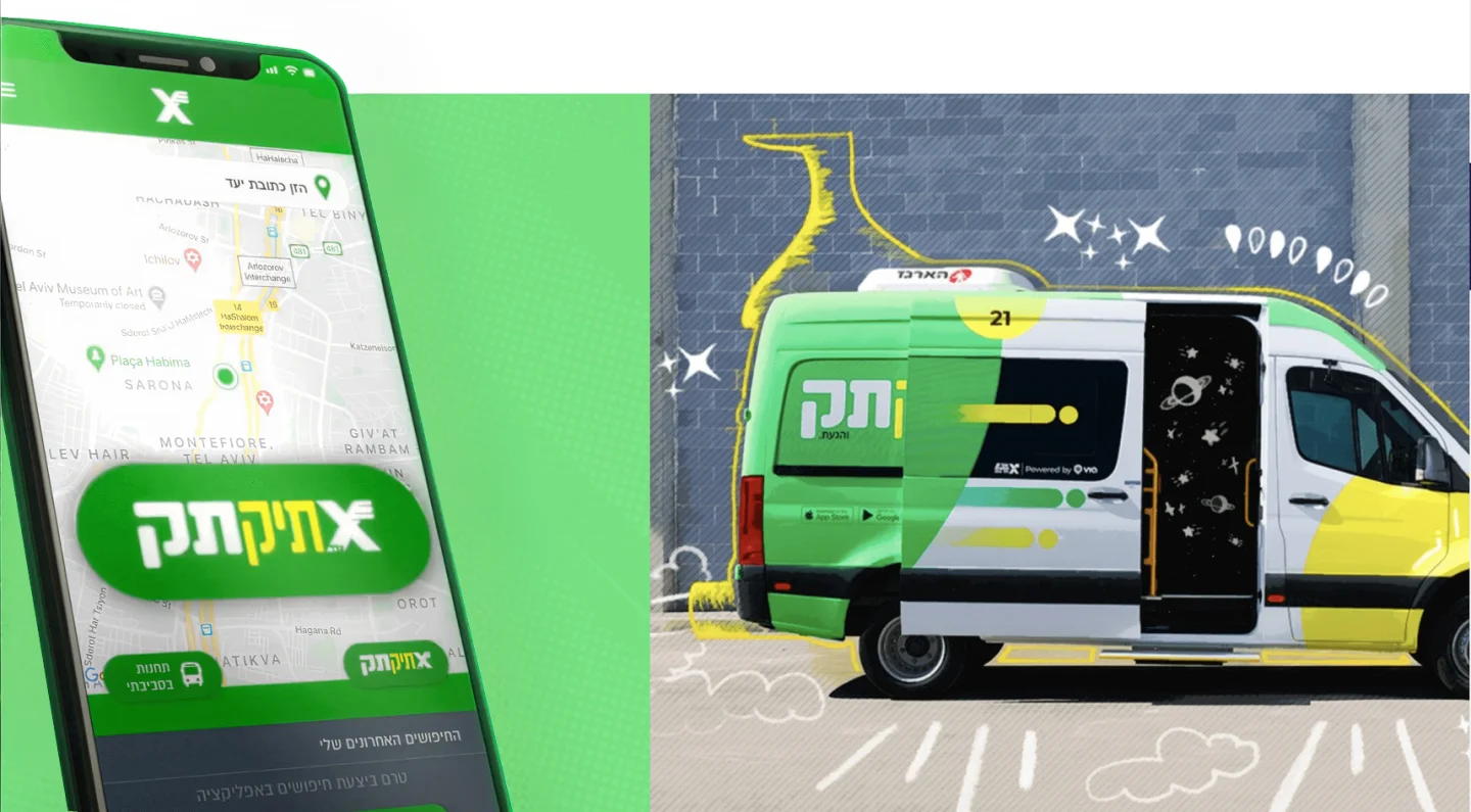 TikTak on-demand minibus picking up a rider in Tel Aviv